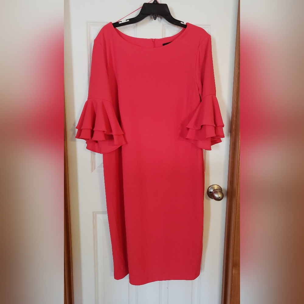 Beautiful Ronni Nicole Coral Dress with 3/4 ruffled sleeves